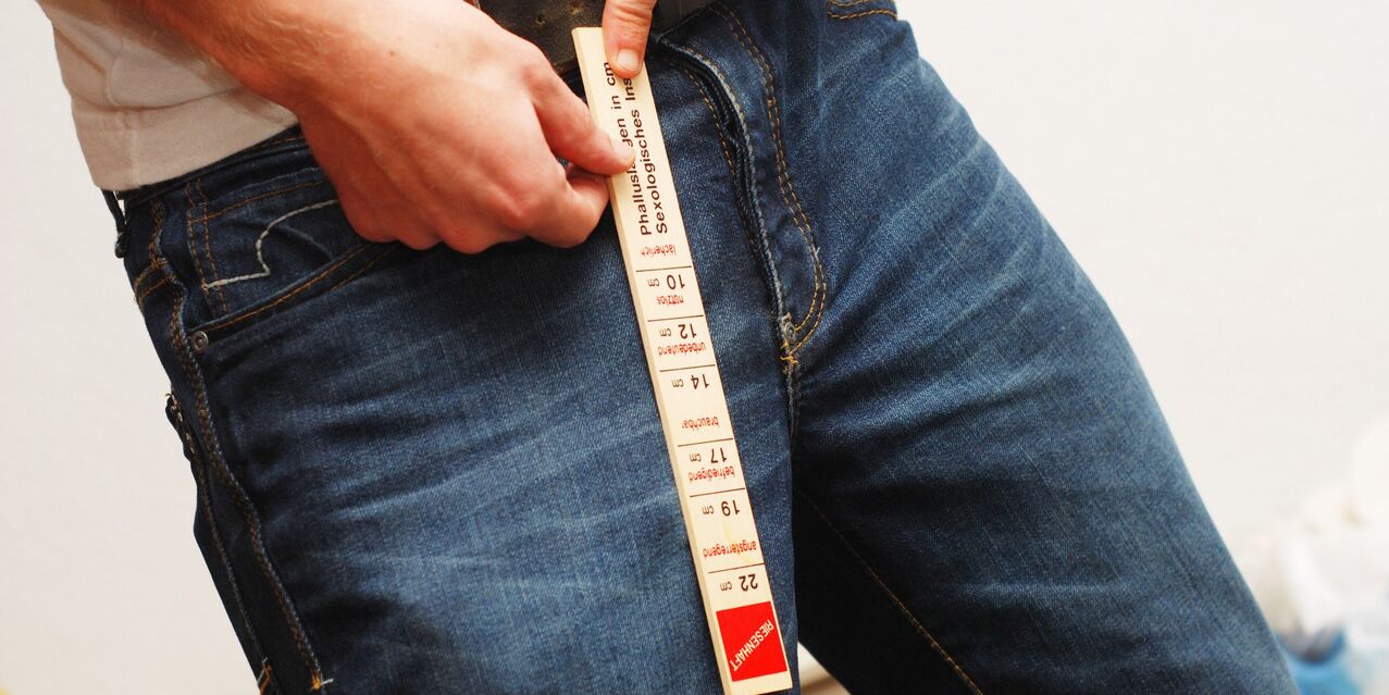 A man measures the length of his members
